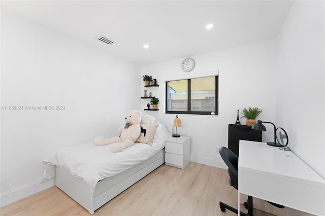 bedroom featuring light hardwood / wood-style floors