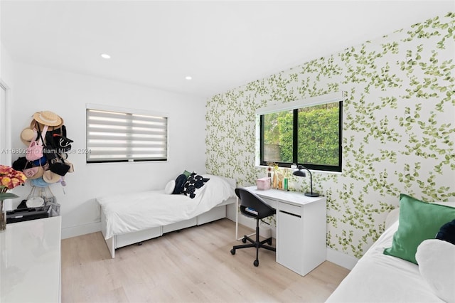 bedroom with light wood-type flooring