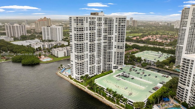aerial view with a water view and a city view
