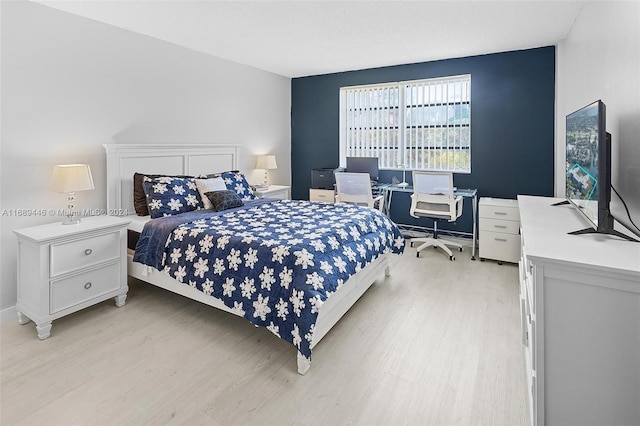 bedroom featuring light hardwood / wood-style flooring