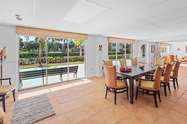 dining area with light tile patterned floors