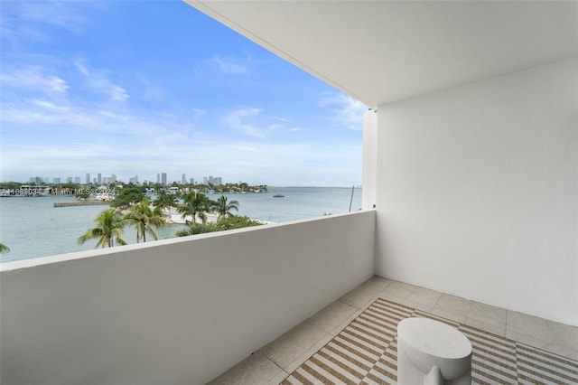 balcony featuring a water view