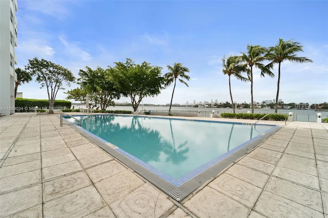 view of pool featuring a patio area