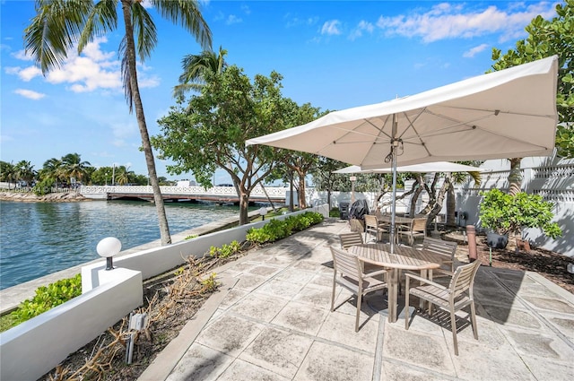 view of patio / terrace featuring a water view