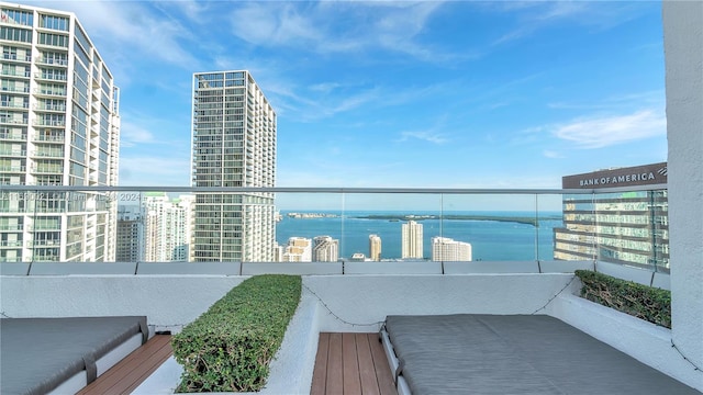 balcony featuring a water view