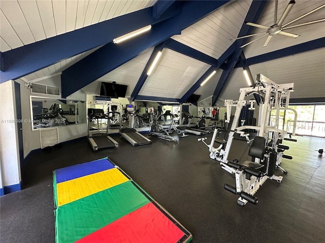 gym featuring vaulted ceiling and ceiling fan