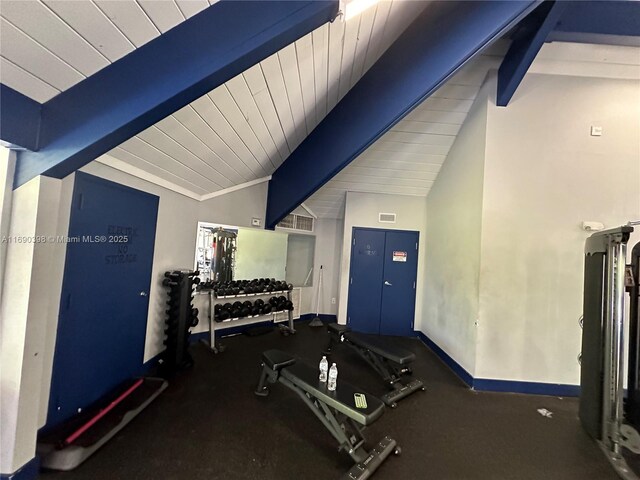 exercise room with lofted ceiling and wood ceiling