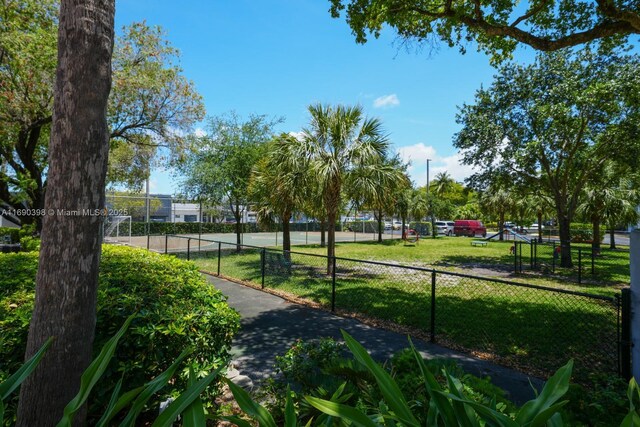 view of home's community featuring a yard