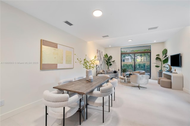 dining space with recessed lighting, visible vents, and baseboards