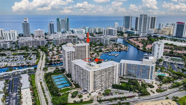 birds eye view of property featuring a water view