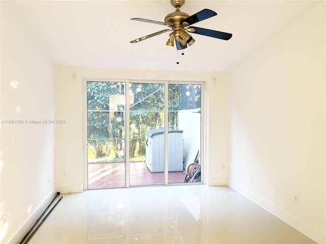 spare room featuring ceiling fan