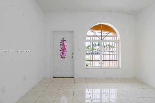 spare room with light tile patterned floors