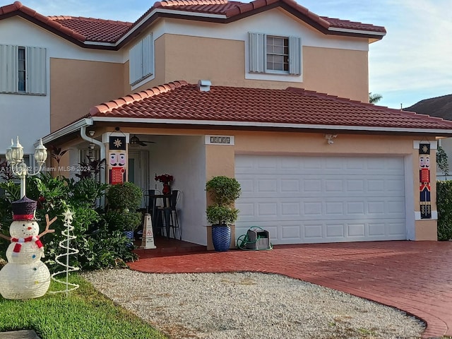 view of front of property with a garage