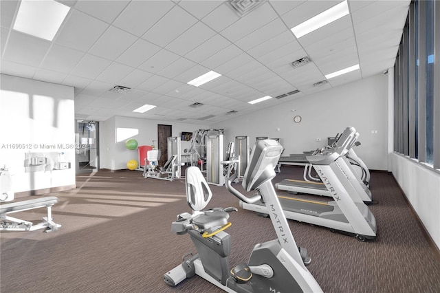 workout area featuring dark carpet