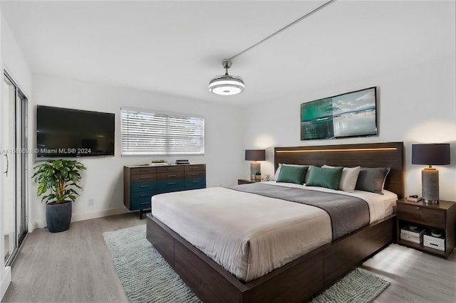 bedroom featuring light hardwood / wood-style floors