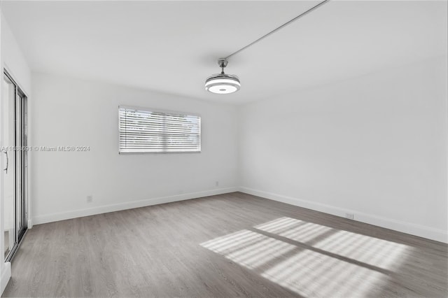 empty room featuring hardwood / wood-style floors