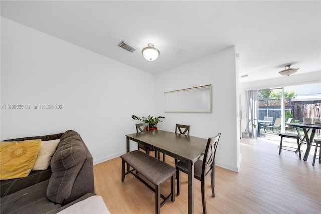 dining room featuring light hardwood / wood-style flooring