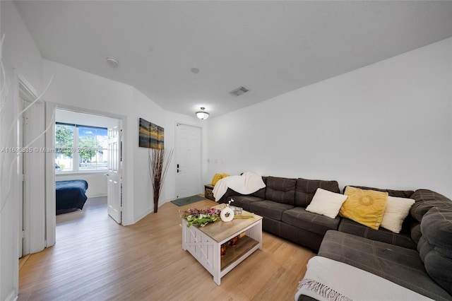 living room featuring light wood-type flooring