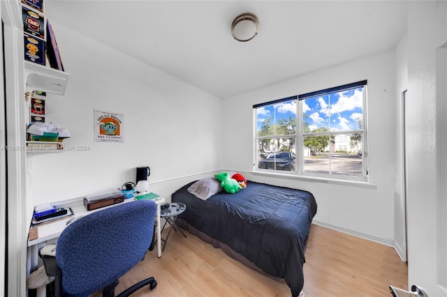 bedroom featuring light hardwood / wood-style floors