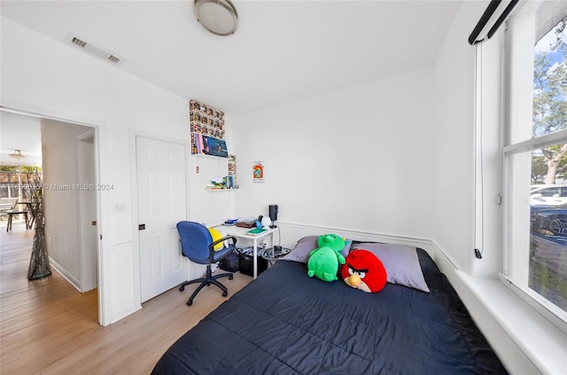 bedroom featuring light hardwood / wood-style floors