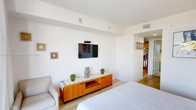 bedroom with light wood-type flooring