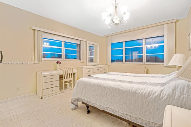 bedroom with a chandelier