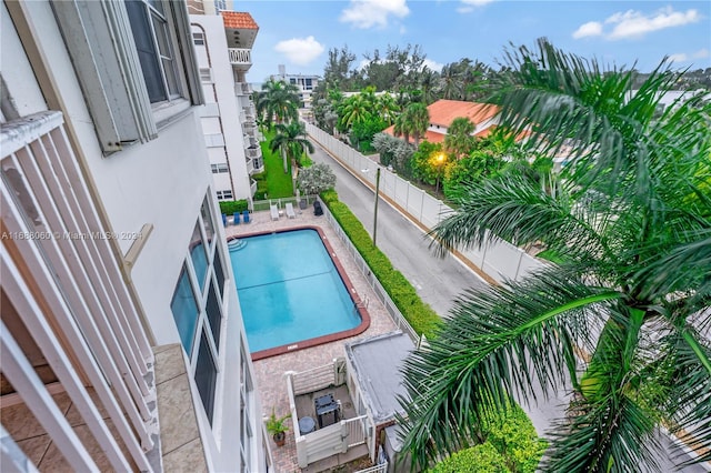 view of swimming pool with a patio area