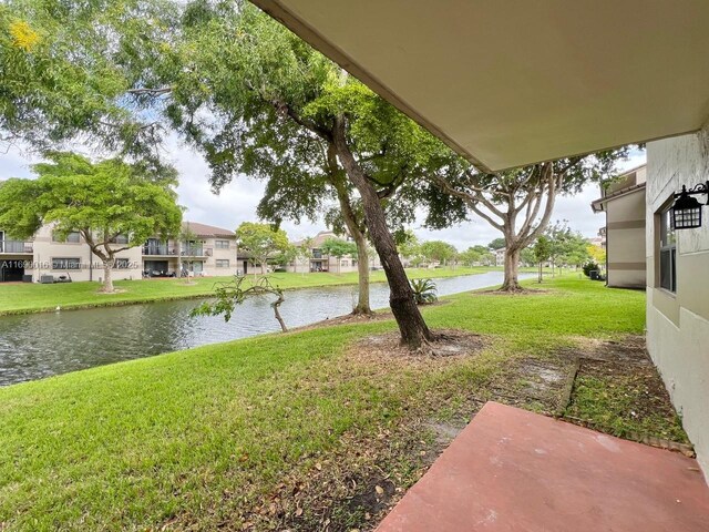 view of patio / terrace with a water view