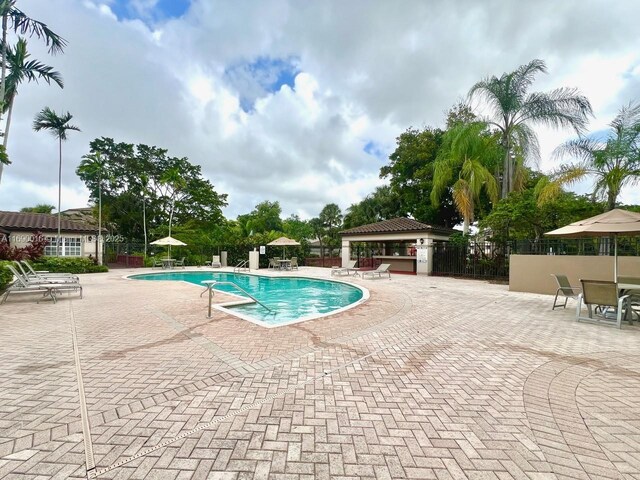 view of pool featuring a patio area and a gazebo