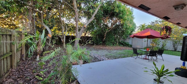 view of patio / terrace with a storage unit