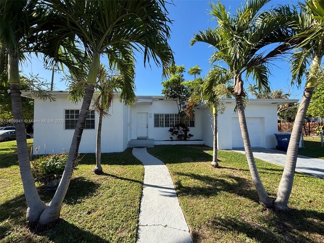 view of side of home featuring a lawn