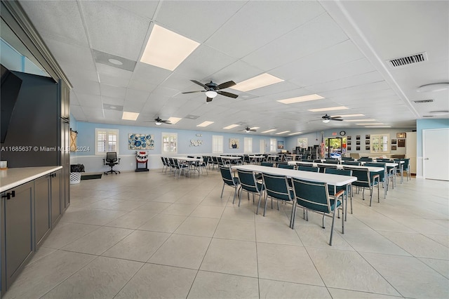 dining area with light tile patterned flooring