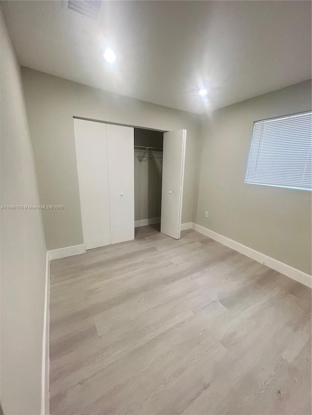 3731 SW 58th Ter, Davie, FL 33314 - unfurnished bedroom with light hardwood / wood-style floors and a closet