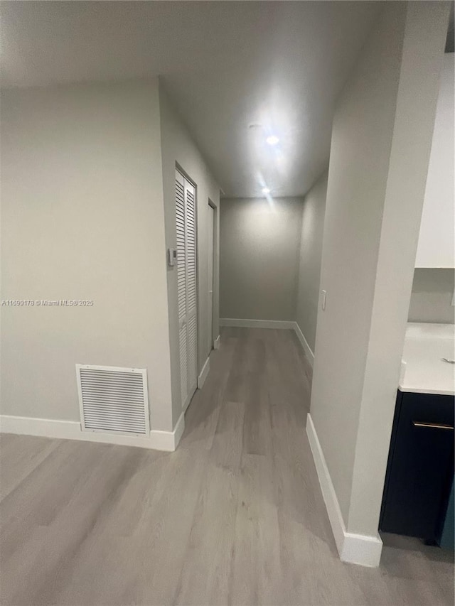 3731 SW 58th Ter, Davie, FL 33314 - hall with light hardwood / wood-style floors