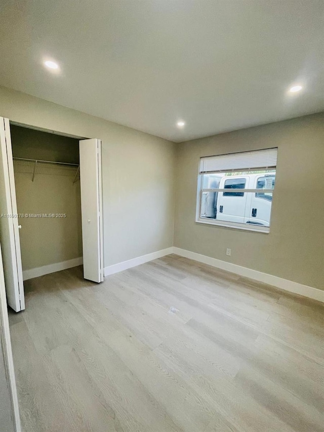 3731 SW 58th Ter, Davie, FL 33314 - unfurnished bedroom with a closet and light wood-type flooring