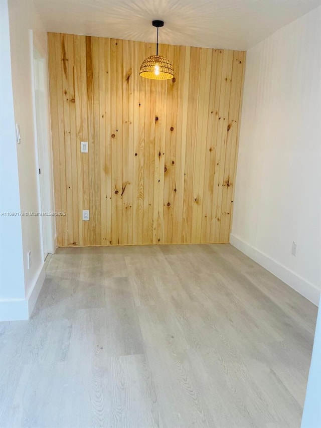 3731 SW 58th Ter, Davie, FL 33314 - spare room with hardwood / wood-style flooring and wooden walls