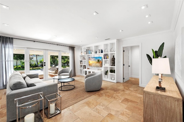 living room featuring built in shelves, french doors, and ornamental molding