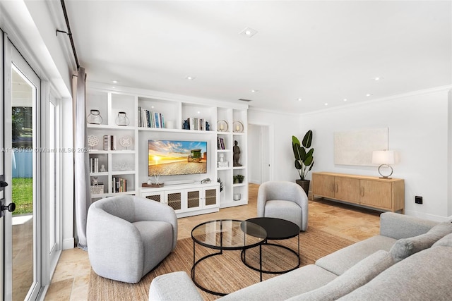 living room featuring crown molding