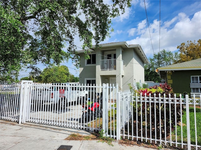 view of front of home with a balcony