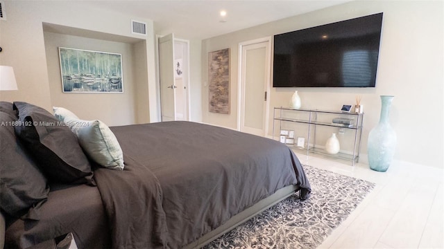 bedroom featuring wood-type flooring