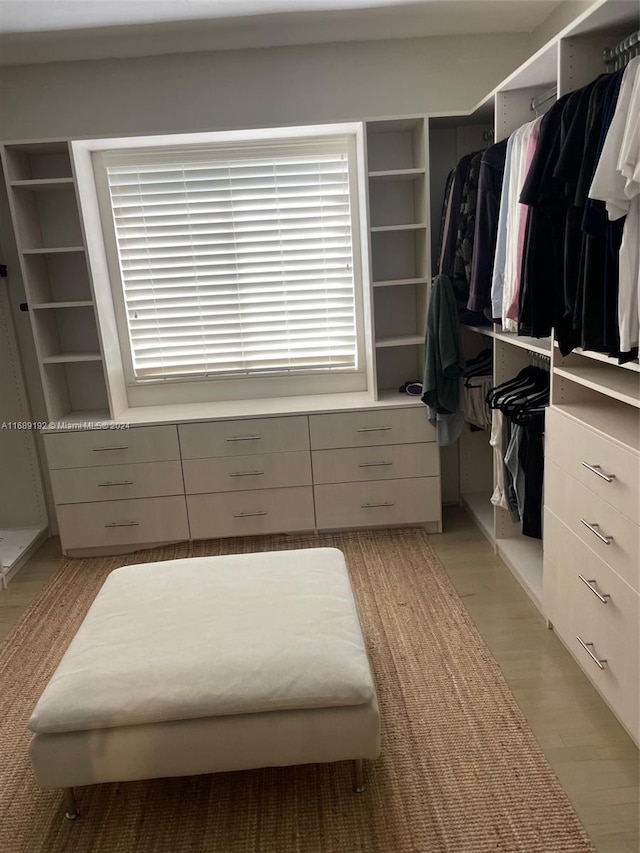 walk in closet featuring light wood-type flooring