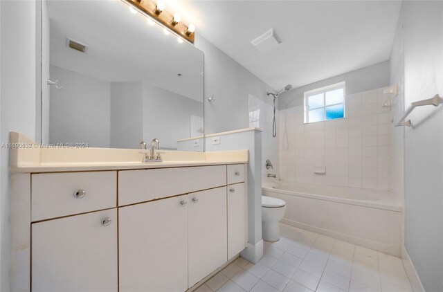 17125 N Bay Rd Unit 3301, Sunny Isles Beach, FL 33160 - full bathroom featuring toilet,  shower combination, vanity, tile patterned floors, and baseboards