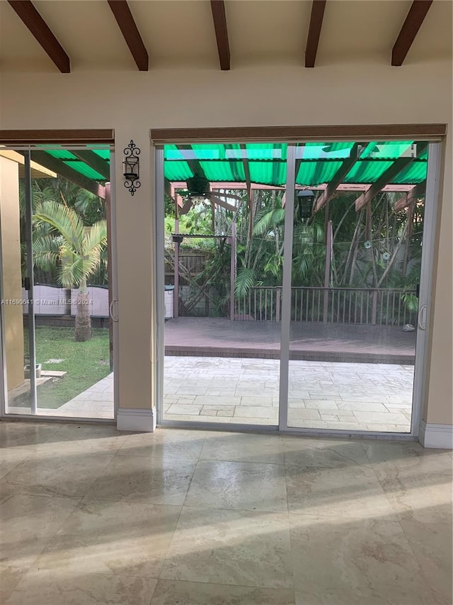 doorway with beam ceiling