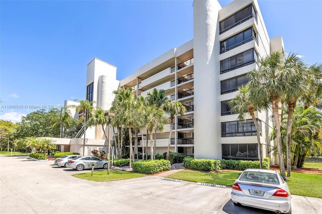 6320 Boca Del Mar Dr Unit 207, Boca Raton, FL 33433 - view of apartment building / complex featuring uncovered parking