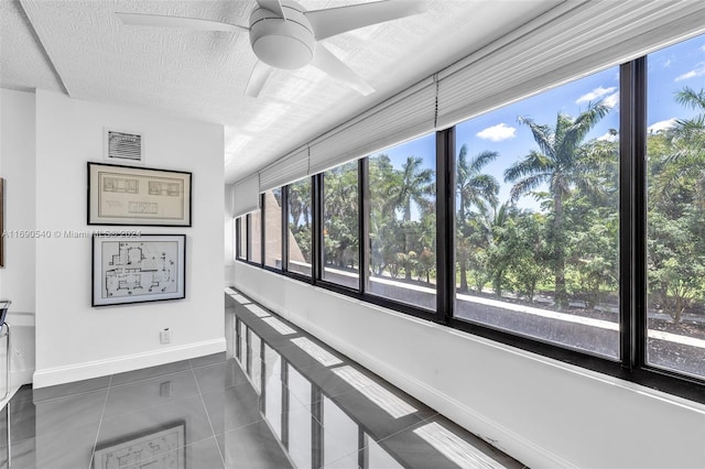 6320 Boca Del Mar Dr Unit 207, Boca Raton, FL 33433 - hall featuring dark tile patterned flooring and baseboards