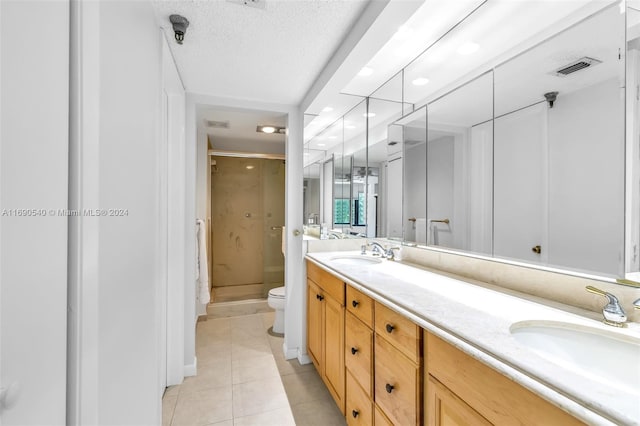 6320 Boca Del Mar Dr Unit 207, Boca Raton, FL 33433 - full bath with a stall shower, tile patterned floors, double vanity, toilet, and recessed lighting