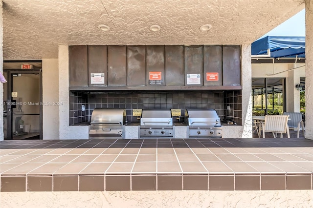 view of patio / terrace with a grill and area for grilling