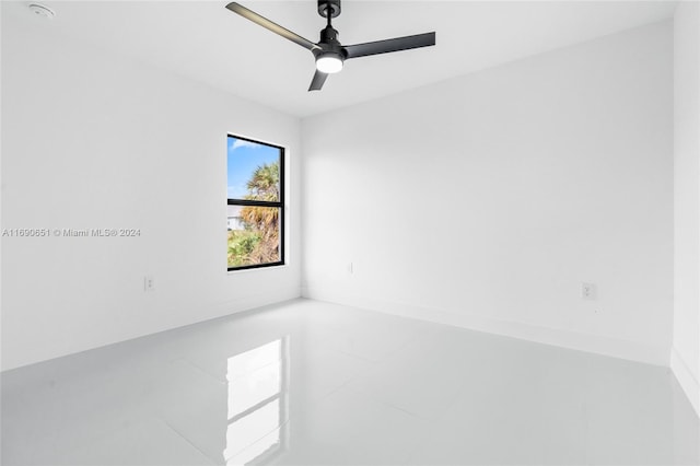 spare room with ceiling fan