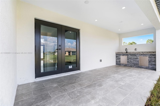 view of patio / terrace featuring french doors