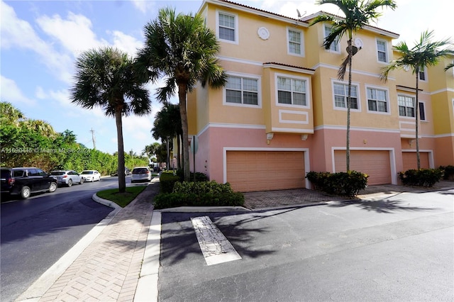 view of property featuring a garage